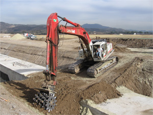 excavator with compact wheel Excavator with ACE compaction wheel