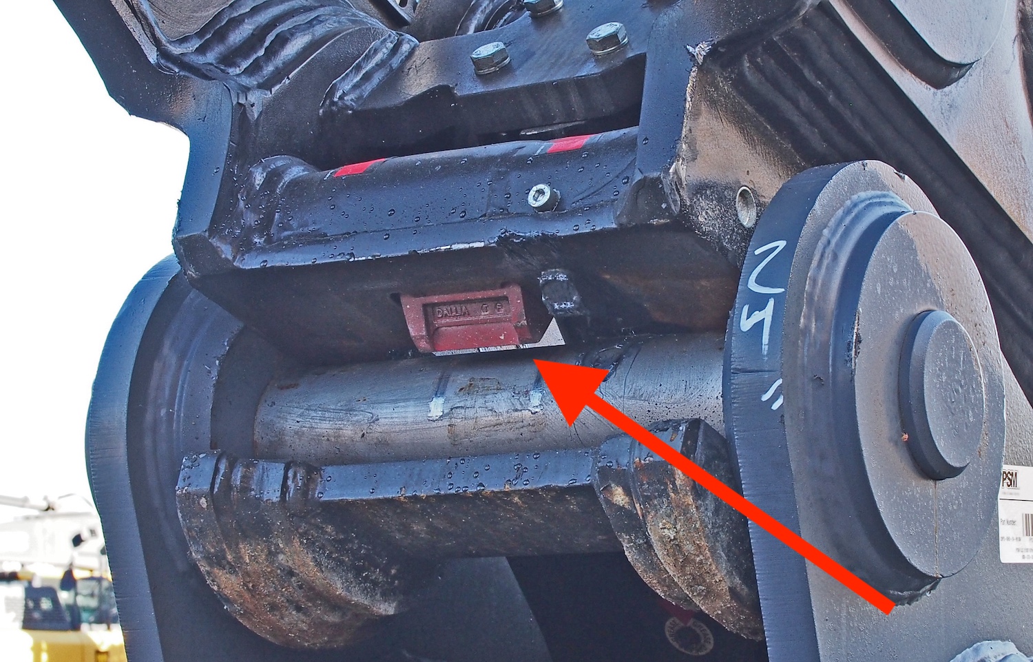 Orange bucket attachment for heavy machinery