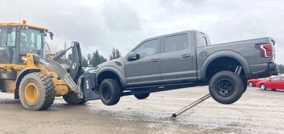 Wheel loader forks with truck lift