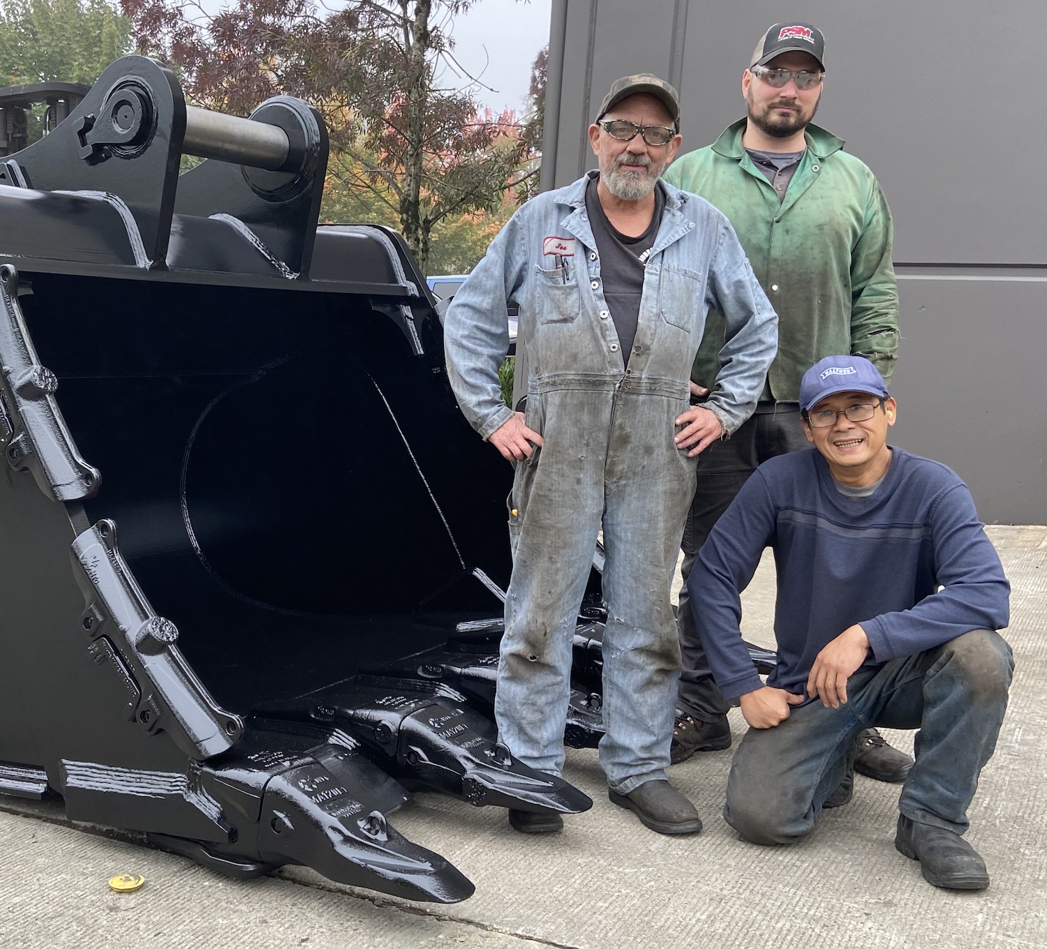 PSM crew with XD bucket