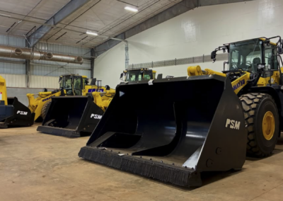 Wheel loader roll out bucket mounted